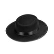 Gaucho Hat — A black felt-look hat with a low flat crown and a wide, flat brim, cut in the South American gaucho 