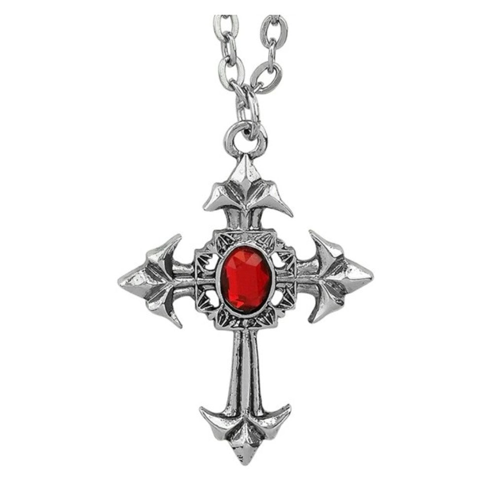 Gothic Cross Necklace with Red Gem — An ornate silver-tone cross pendant with a single red stone at its centre, hung on a matching chain.