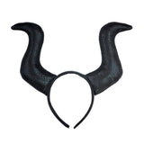 Horned Villain Headband — A black fabric-covered headband with two curved horns rising from either side, in the style of a dar