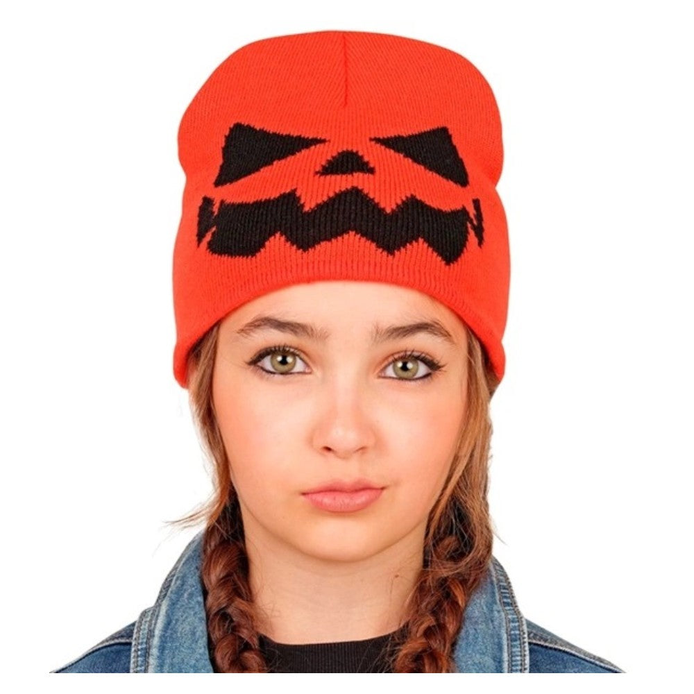 Child wearing the pumpkin knitted beanie hat