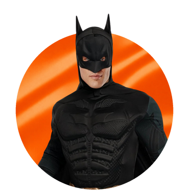 DC Comics costumes - man in a Batman armoured costume, on an orange satin circle