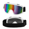 White Après-Ski Party Goggles — A pair of wide ski-style goggles in white with a curved tinted lens and a wide elastic strap.